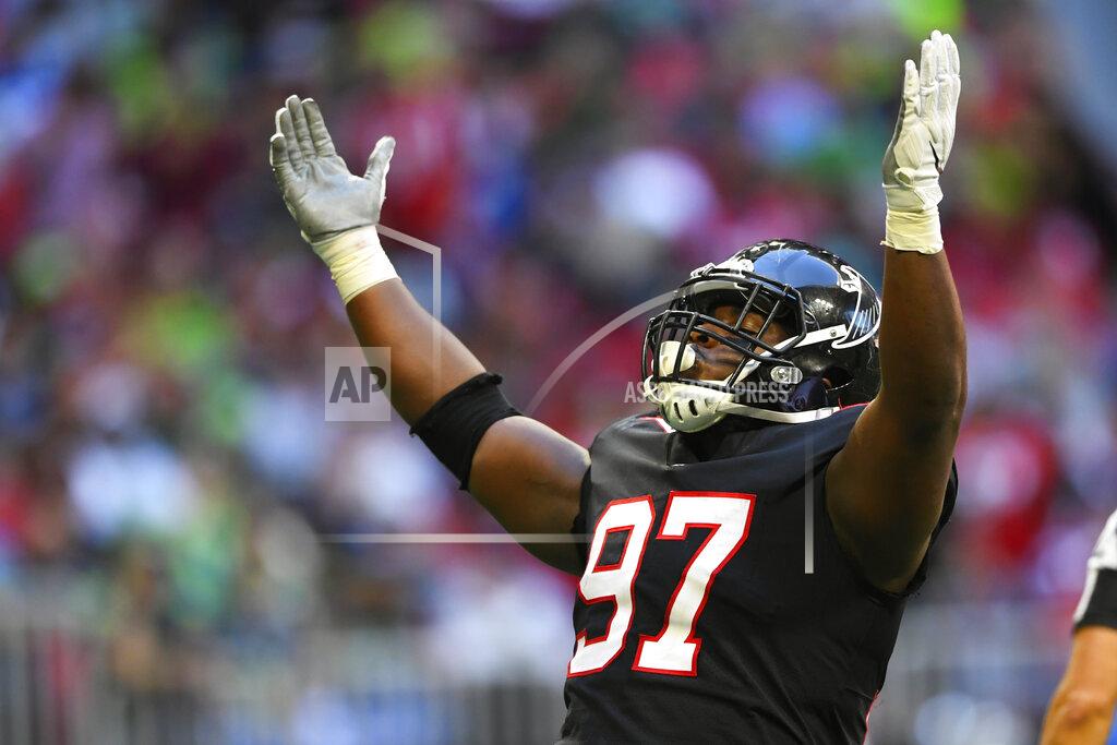 John Amis Atlanta Falcons defensive tackle Grady Jarrett (97) celebrates his sacking of Seattle Seahawks quarterback Russell Wilson during the second half of an NFL football game, Sunday, Oct. 27, 2019, in Atlanta. (AP Photo/John Amis)