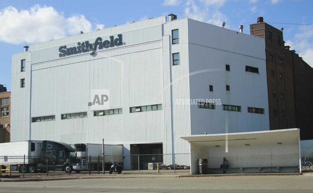 FILE - This April 8, 2020 file photo, shows the Smithfield pork processing plant in Sioux Falls, S.D. The union representing employees at the South Dakota pork processing plant says it will partially reopen on Monday, May 4, 2020, after shuttering more than two weeks ago because of a coronavirus outbreak that infected hundreds of employees. (AP Photo/Stephen Groves File)