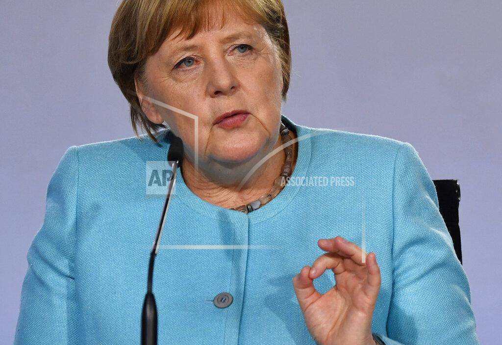 John Macdougall German Chancellor Angela Merkel speaks at a press conference at the Chancellery in Berlin, Wednesday June 3, 2020, after coalition meetings. Germany’s governing parties agreed on a 130 billion euro ($146 billion) stimulus package Wednesday meant to help kick-start Europe’s biggest economy, which has taken a heavy hit from the coronavirus pandemic. Following two days of talks in Berlin, Chancellor Angela Merkel said the package was a “bold response” that would boost consumption and investment and ease the strain on families and others. (John MacDougall/Pool via AP)