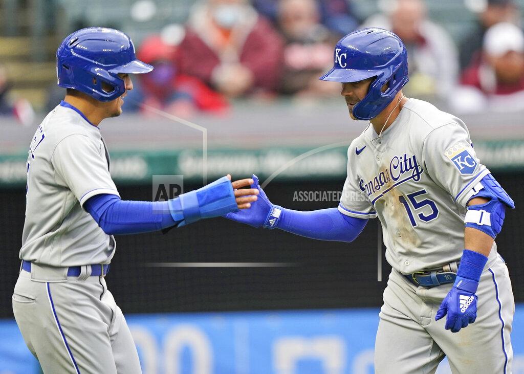 Tony Dejak Kansas City Royals Whit Merrifield, right, is congratulated by Nicky Lopez after Merrifield hit a two-run home run in the second inning of a baseball game against the Cleveland Indians, Monday, April 5, 2021, in Cleveland. Lopez scored on the play. (AP Photo/Tony Dejak)