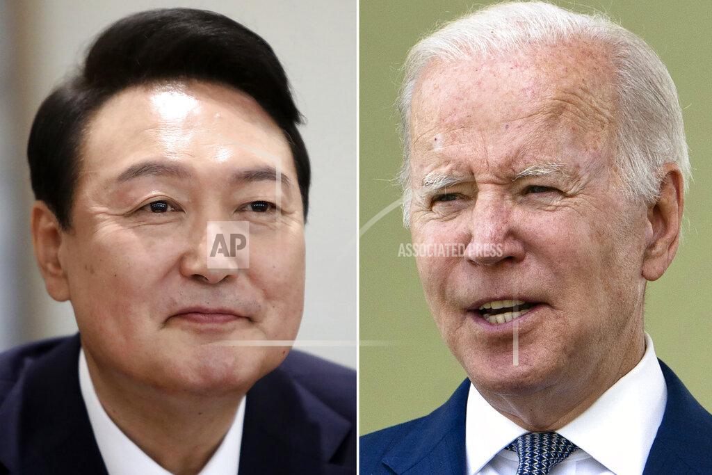 Uncredited FILE - This photo combination of two file photos shows U.S. President Joe Biden, right, in Washington, on May 15, 2022, and South Korean President Yoon Suk Yeol in Seoul, on May 10, 2022. When the U.S. and South Korean leaders meet Saturday, May 21, North Korea’s nuclear weapons and missile program, already a major focus, may receive extra attention if intelligence predictions of an imminent major weapons demonstration by the North, which is struggling with a COVID-19 outbreak, are right. (AP Photo/File)