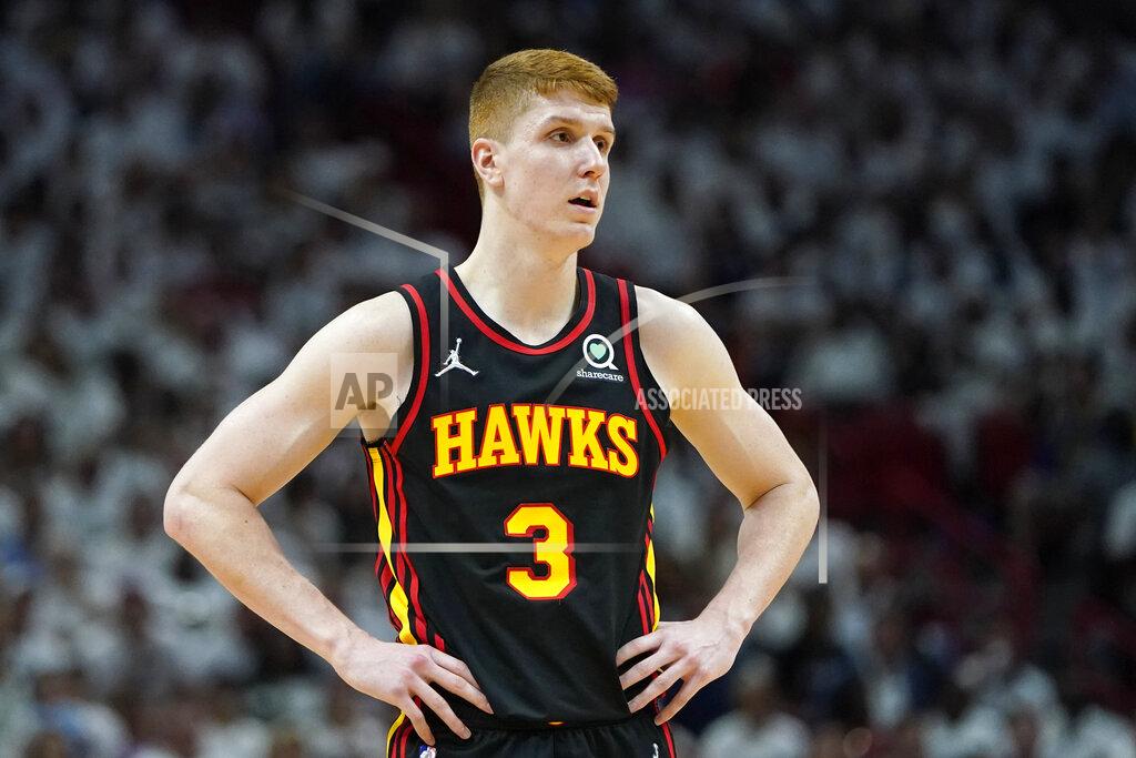 Lynne Sladky FILE - Atlanta Hawks guard Kevin Huerter (3) stands on the court during the first half of Game 2 of an NBA basketball first-round playoff series against the Miami Heat, Tuesday, April 19, 2022, in Miami. The Atlanta Hawks are trading Kevin Huerter to the Sacramento Kings for Justin Holiday, Mo Harkless and a future conditional draft pick, according to a person with direct knowledge of the agreement. The person spoke to The Associated Press on condition of anonymity Friday, July 1, 2022, because the trade had not been formally approved by the NBA and announced by either club. (AP Photo/Lynne Sladky, File)