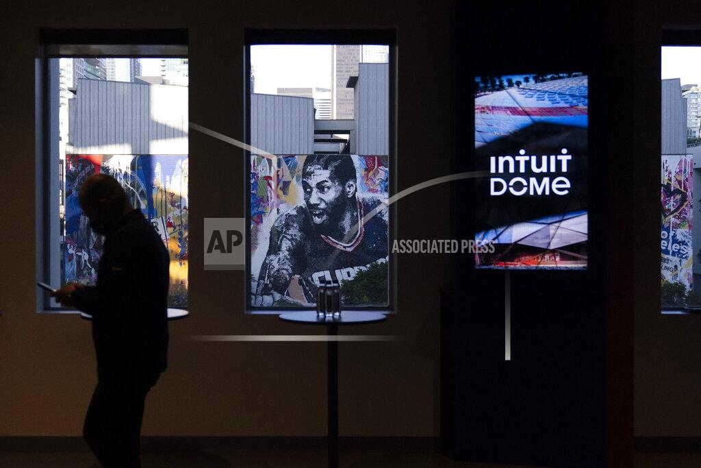 Jae C. Hong A mural depicting Los Angeles Clippers' Kawhi Leonard is seen through a window of a model room of Intuit Dome, a proposed arena for the Clippers located in Inglewood, Calif., Thursday, Sept. 16, 2021, in Los Angeles. (AP Photo/Jae C. Hong)