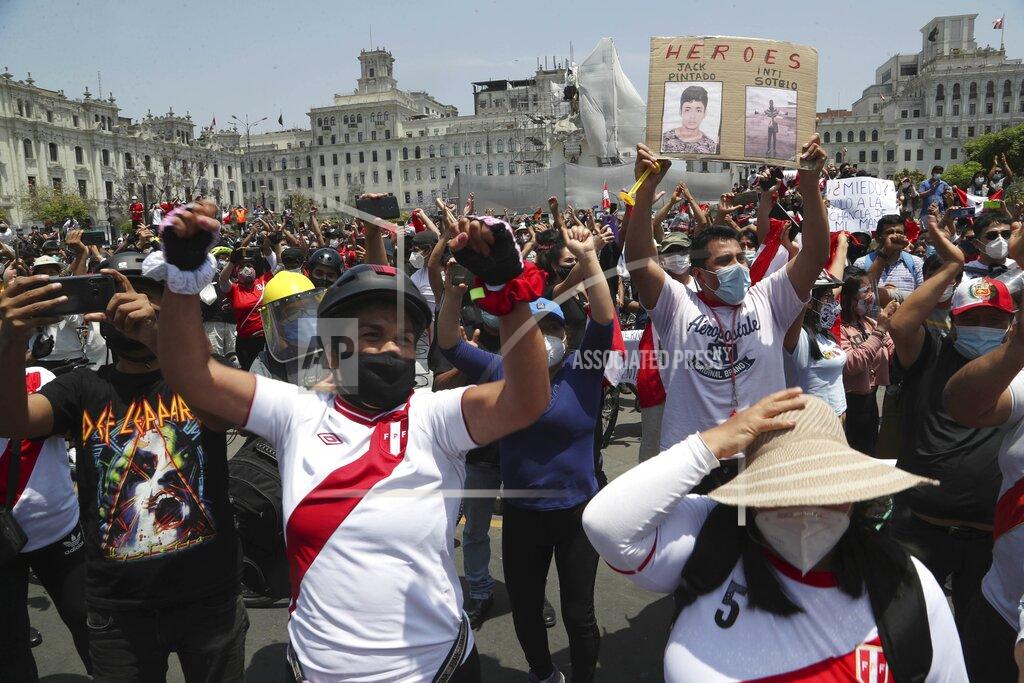 Martin Mejia People celebrate after the resignation of interim president Manuel Merino, at Plaza San Martin in Lima, Peru, Sunday, Nov. 15, 2020. Merino resigned after a violent crackdown on protests that left at least two people dead followed by an exodus of his cabinet members. (AP Photo/Martin Mejia)
