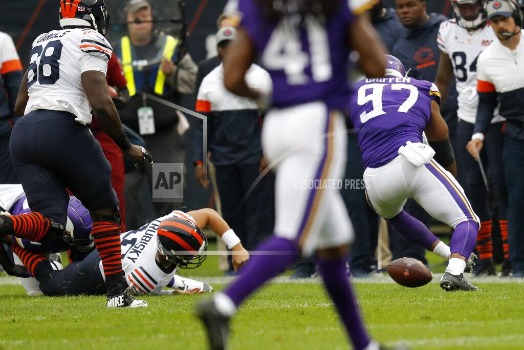 Charles Rex Arbogast Chicago Bears quarterback Mitchell Trubisky, left, is injured as he fumbles toward Minnesota Vikings defensive end Everson Griffen (97) during the half of an NFL football game Sunday, Sept. 29, 2019, in Chicago. (AP Photo/Charles Rex Arbogast)