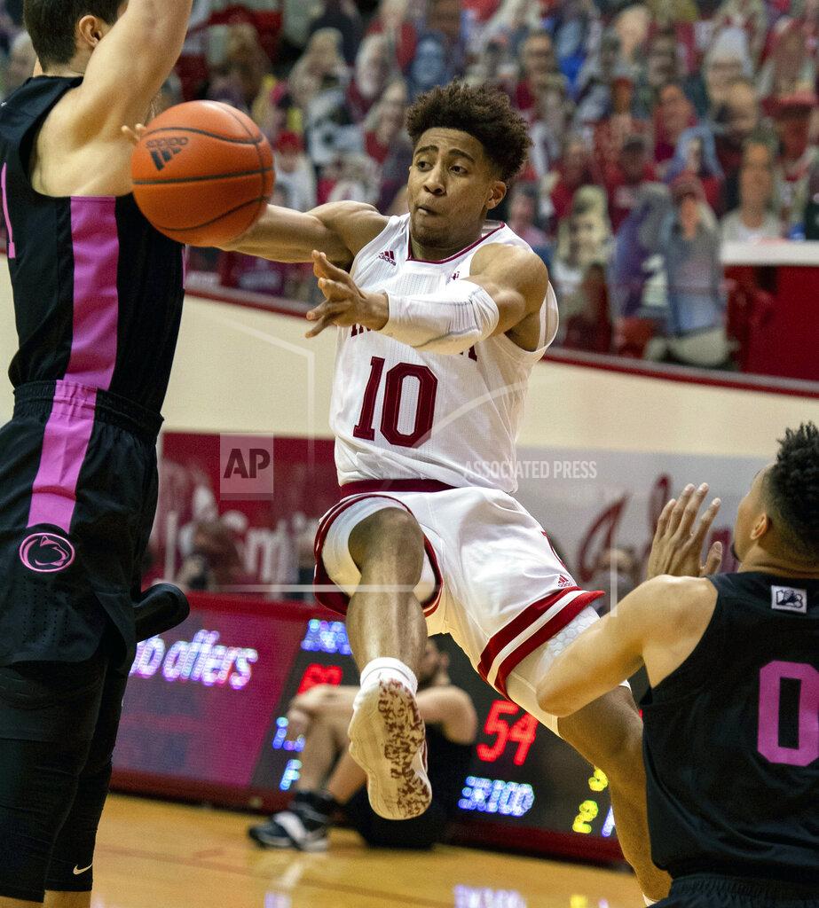 Doug Mcschooler Indiana guard Rob Phinisee (10) passes the ball off to a teammate during the second half of an NCAA college basketball game against Penn State, Wednesday, Dec. 30, 2020, in Bloomington, Ind. Indiana won 87-85 in overtime. (AP Photo/Doug McSchooler)