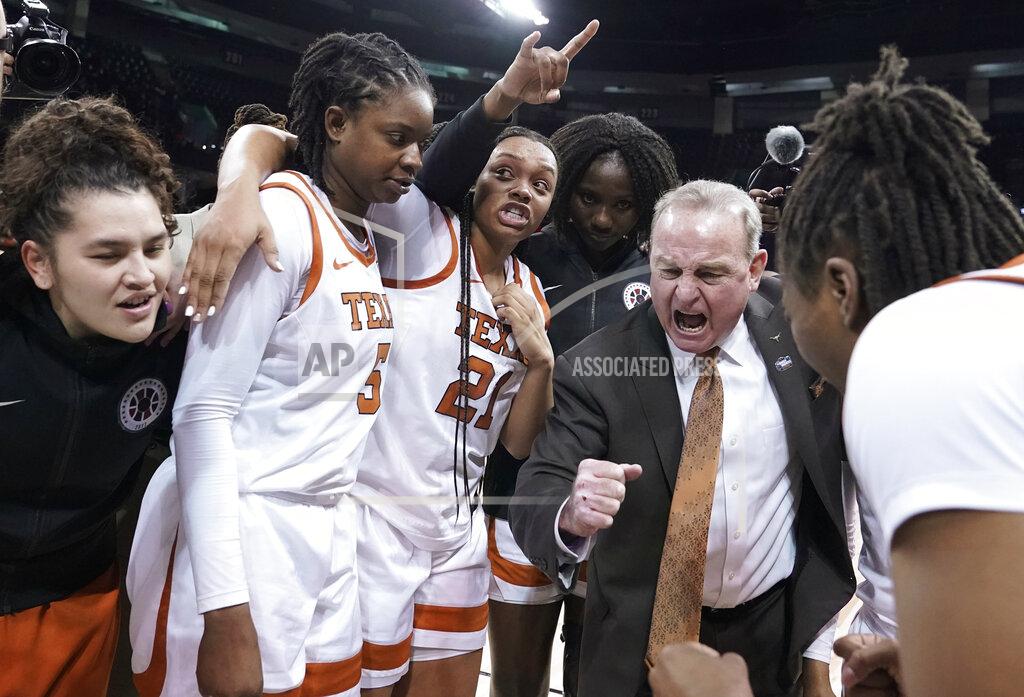 Ted S. Warren Texas head coach Vic Schaefer reacts as he huddles with his team after a college basketball game in the Sweet 16 round of the NCAA tournament, Friday, March 25, 2022, in Spokane, Wash. Texas won 66-63. (AP Photo/Ted S. Warren)