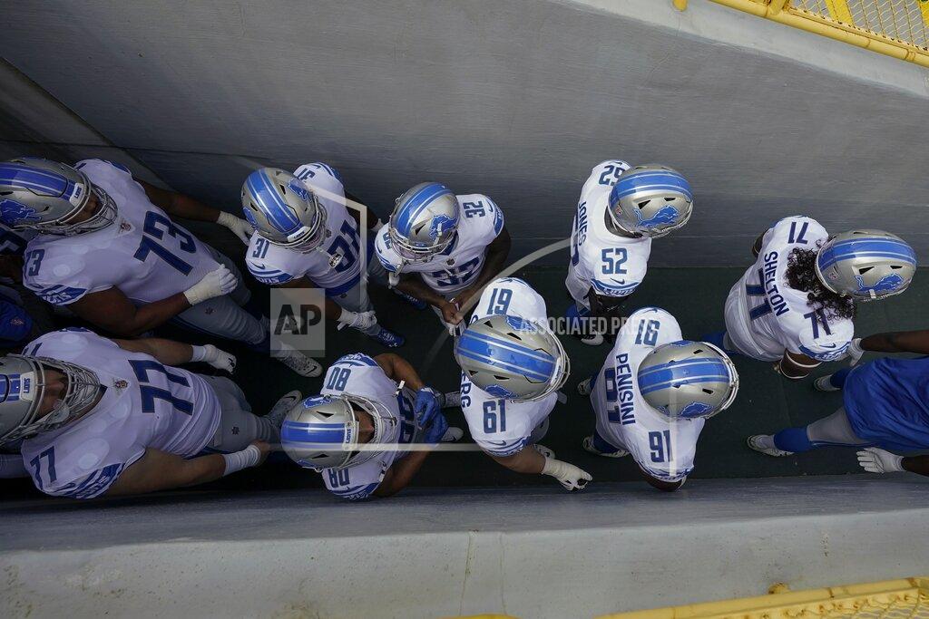 Morry Gash Detroit Lions players wait in the tunnel to be introduced before an NFL football game against the Green Bay Packers Sunday, Sept. 20, 2020, in Green Bay, Wis. (AP Photo/Morry Gash)