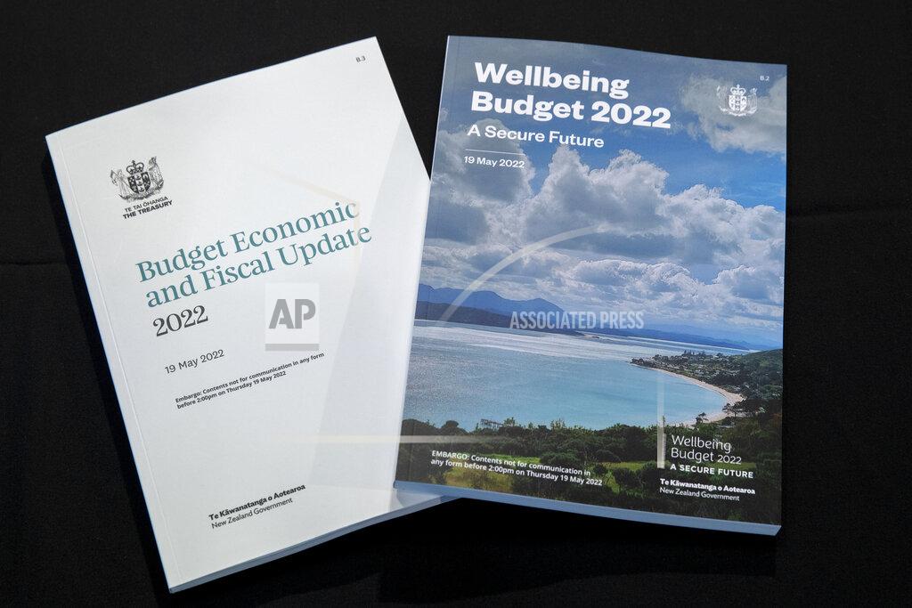Mark Mitchell This photo shows New Zealand Finance Minister Grant Robertson's "Wellbeing Budget 2022" papers in Wellington, New Zealand, Thursday, May 19, 2022. New Zealand's government said Thursday it will hand out an extra few hundred dollars to about half of all adults to help them navigate what it describes as "the peak of the global inflation storm." (Mark Mitchell/NZ Herald via AP)