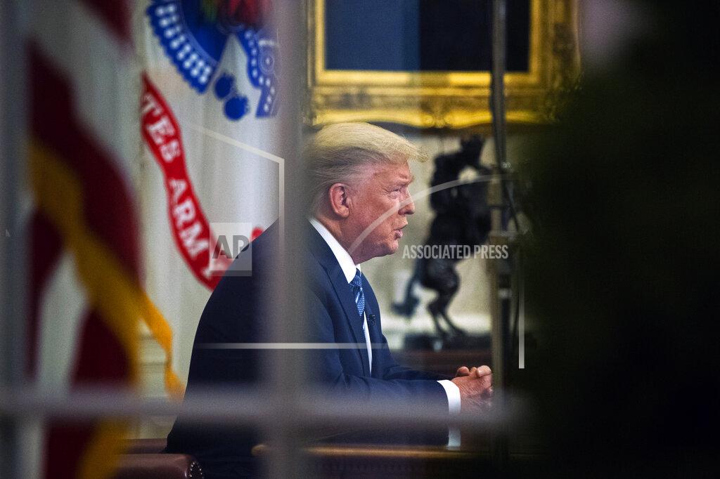 Manuel Balce Ceneta FILE - In this March 11, 2020, file photo, President Donald Trump addresses the nation from the Oval Office about the coronavirus outbreak at the White House in Washington. (AP Photo/Manuel Balce Ceneta, File)