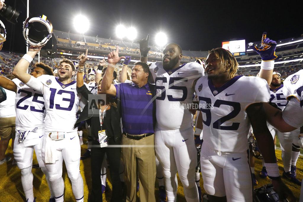 Tyler Kaufman LSU head coach Ed Orgeron and his team celebrate a victory after an NCAA college football game against Mississippi State in Baton Rouge, La., Saturday, Oct. 20, 2018. LSU won 19-3. (AP Photo/Tyler Kaufman)