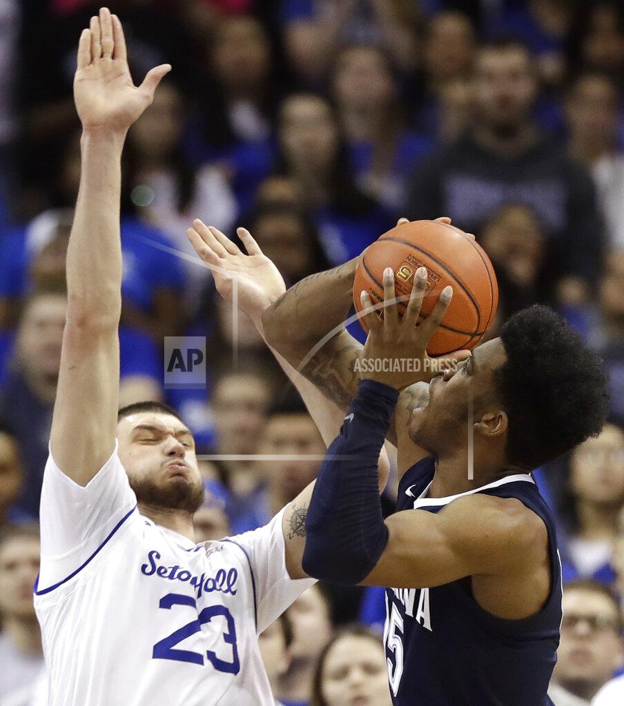 Kathy Willens Seton Hall forward Sandro Mamukelashvili (23) defends as Villanova forward Saddiq Bey (15) looks to pass during the second half of an NCAA college basketball game, Saturday, March 9, 2019, in Newark, N.J. Seton Hall defeated Villanova 79-75. (AP Photo/Kathy Willens)