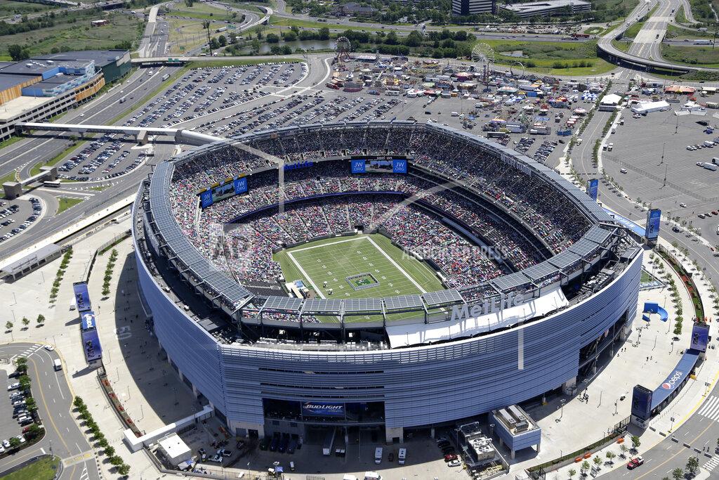 Seth Wenig FILE - This is an aerial view showing MetLife Stadium in East Rutherford, N.J., June 20, 2014. There are 23 venues bidding to host soccer matches at the 2026 World Cup in the United States, Mexico and Canada. (AP Photo/Seth Wenig, File)
