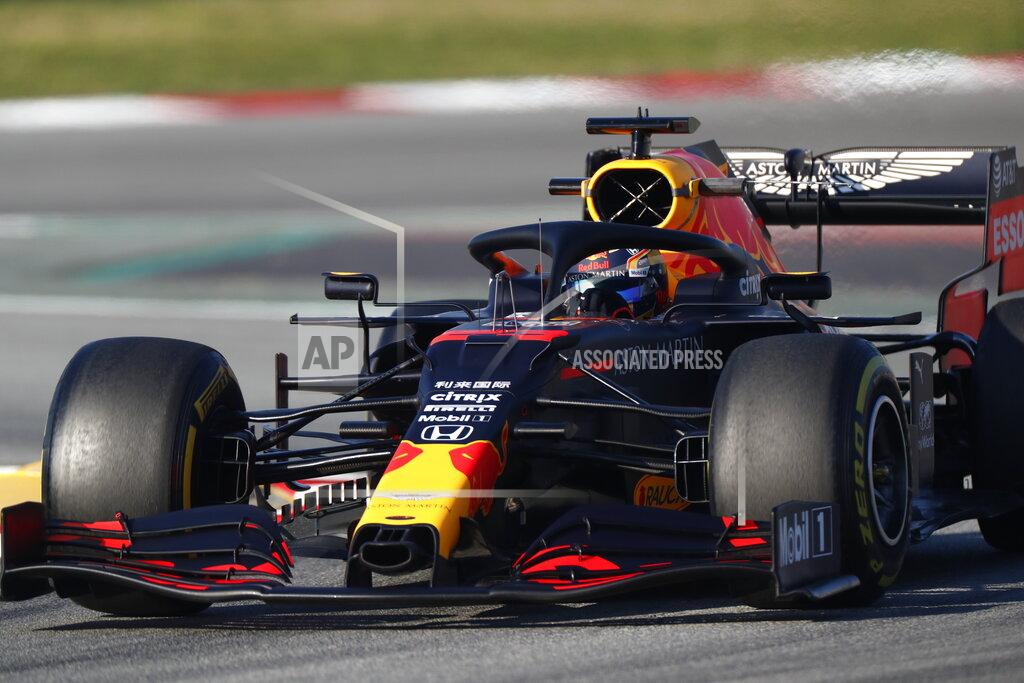 Joan Monfort Aston Martin Red Bull Racing's Alexander Albon drives during a Formula One pre-season testing session at the Barcelona Catalunya racetrack in Montmelo, outside Barcelona, Spain, Thursday, Feb. 20, 2020. (AP Photo/Joan Monfort)