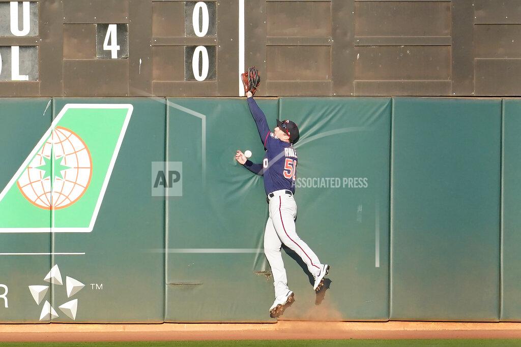 Jeff Chiu Minnesota Twins right fielder Brent Rooker cannot catch a double hit by Oakland Athletics' Seth Brown during the second inning of the second baseball game of a doubleheader in Oakland, Calif., Tuesday, April 20, 2021. (AP Photo/Jeff Chiu)