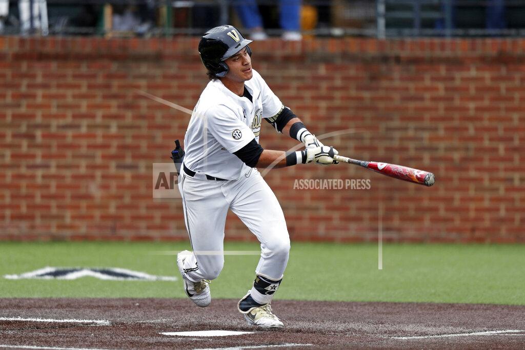 Wade Payne FILE - In this May 11, 2019, file photo, Vanderbilt's Austin Martin connects for a hit during an NCAA college baseball game against Missouri in Nashville, Tenn. The Detroit Tigers are rebuilding around an impressive group of minor league pitchers. Now, it might be time to add a star hitting prospect to the mix. Whether it’s Arizona State slugger Spencer Torkelson or Vanderbilt’s Austin Martin, Detroit has a chance to add another potential standout when it makes the No. 1 selection in Wednesday night’s Major League Baseball draft. (AP Photo/Wade Payne, FIle)