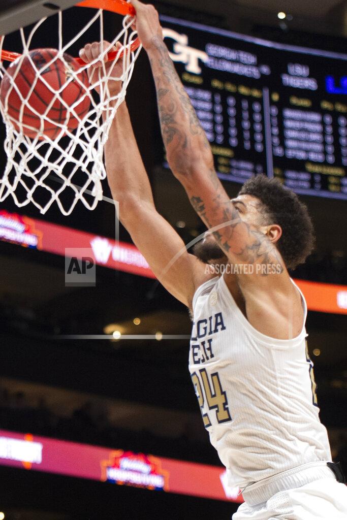 Hakim Wright Sr. Georgia Tech center Rodney Howard scores during the first half of the team's NCAA college basketball game against LSU on Saturday, Dec. 11, 2021, in Atlanta. (AP Photo/Hakim Wright Sr.)