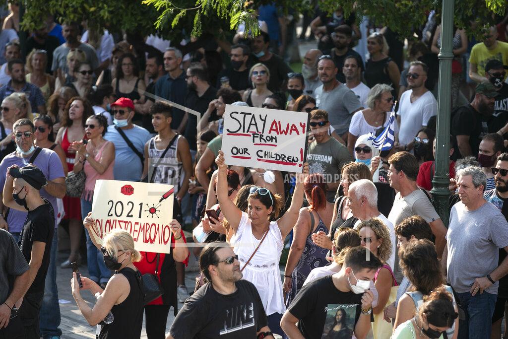 Yorgos Karahalis Anti-vaccine protesters take part in a rally at Syntagma square, central Athens, on Wednesday, July 21, 2021. Thousands of people protested against Greek government's measures to curb rising COVID-19 infections and drive up vaccinations in the country where almost 50% of Greeks and country residents have received at least one dose of the vaccine. (AP Photo/Yorgos Karahalis)
