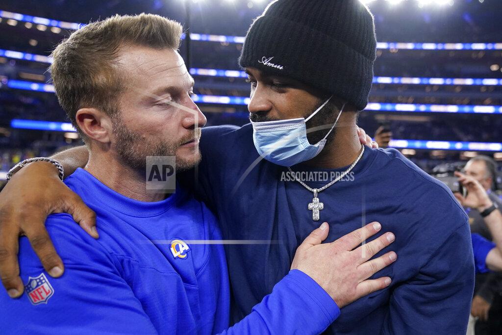 Los Angeles Rams head coach Sean McVay, left, celebrates with Robert Woods after the NFC Championship NFL football game against the San Francisco 49ers Sunday, Jan. 30, 2022, in Inglewood, Calif. The Rams won 20-17 to advance to the Super Bowl. (AP Photo/Marcio Jose Sanchez)