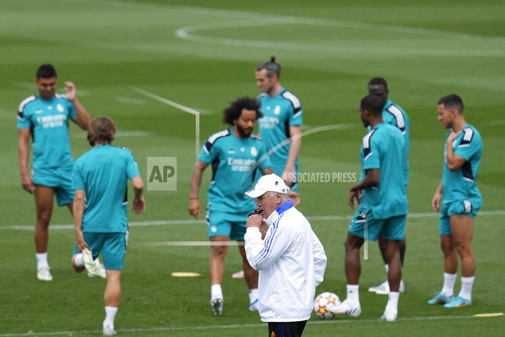 Manu Fernandez Real Madrid's head coach Carlo Ancelotti blows his whistle during a Media Opening day training session in Madrid, Spain, Tuesday, May 24, 2022. Real Madrid will play Liverpool in Saturday's Champions League soccer final in Paris. (AP Photo/Manu Fernandez)