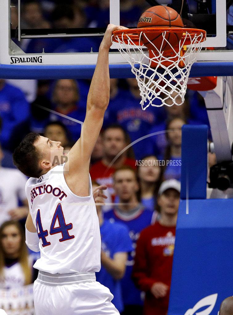 Charlie Riedel Kansas' Mitch Lightfoot dunks the ball during the second half of an NCAA college basketball game against Eastern Michigan Saturday, Dec. 29, 2018, in Lawrence, Kan. Kansas won 87-63. (AP Photo/Charlie Riedel)