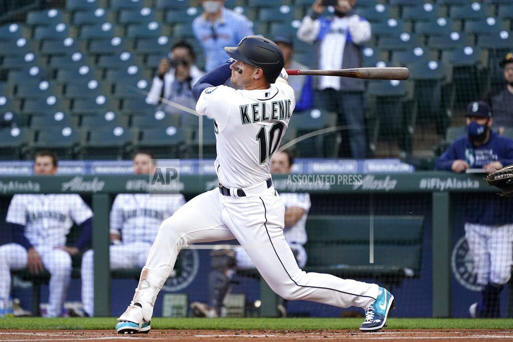 Elaine Thompson Seattle Mariners' Jarred Kelenic watches his foul ball in his first major league at-bat, in the first inning of the team's baseball game against the Cleveland Indians on Thursday, May 13, 2021, in Seattle. Kelenic flied out on the at-bat. (AP Photo/Elaine Thompson)