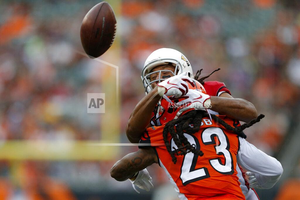 Gary Landers Cincinnati Bengals cornerback B.W. Webb (23) breaks up a pass to Arizona Cardinals wide receiver Larry Fitzgerald, above, in the second half of an NFL football game, Sunday, Oct. 6, 2019, in Cincinnati. (AP Photo/Gary Landers)