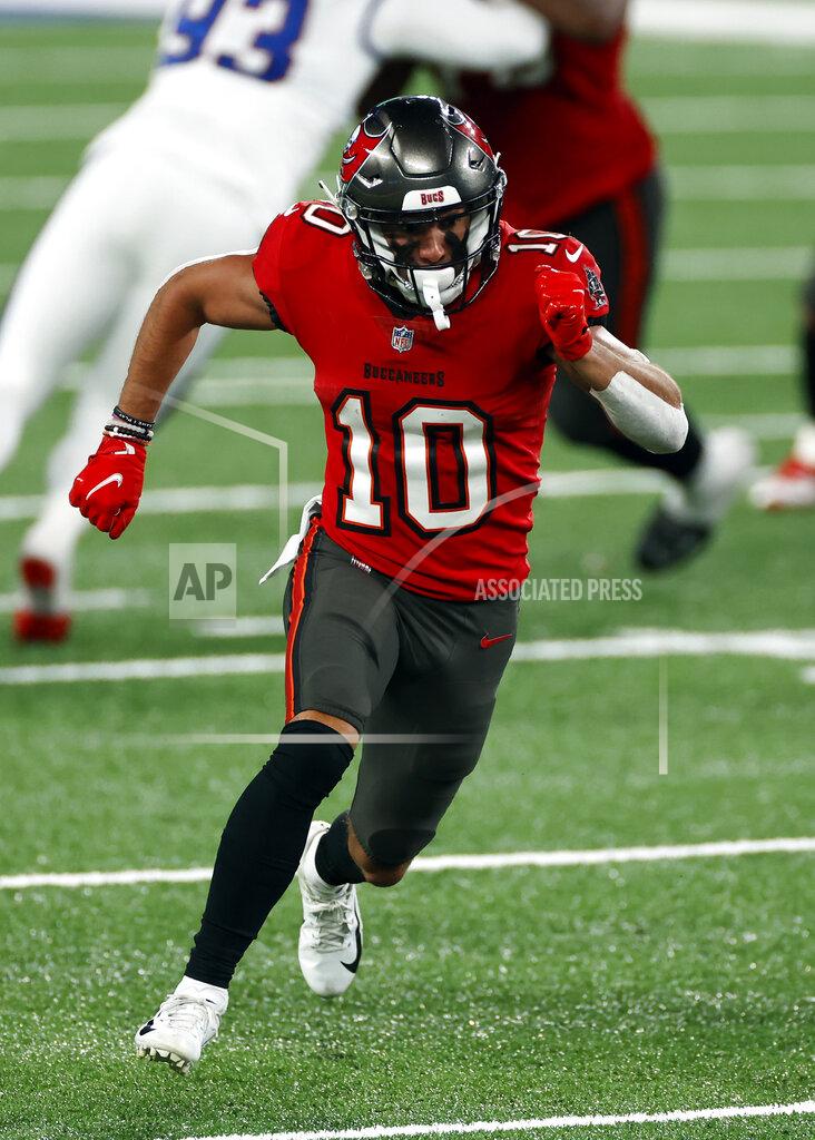 Adam Hunger FILE - In this Nov. 2, 2020, file photo, Tampa Bay Buccaneers wide receiver Scotty Miller (10) runs during an NFL football game against the New York Giants in East Rutherford, N.J. Kansas City Chiefs star Tyreek Hill wants to be the Super Bowl halftime show. Hill said Monday, Feb. 1, 2021, he’d be willing to race Miller during intermission at Raymond James Stadium on Sunday. (AP Photo/Adam Hunger, File)