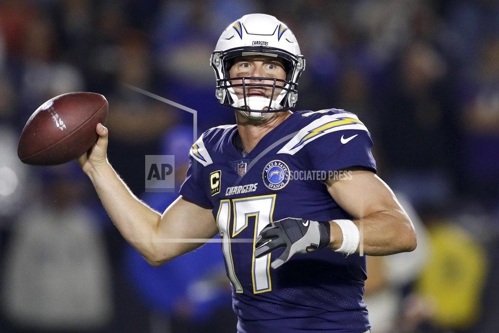 Marcio Jose Sanchez FILE - In this Dec. 22, 2018 file photo, Los Angeles Chargers quarterback Philip Rivers passes against the Baltimore Ravens during the first half in an NFL football game in Carson, Calif. The Chargers are making their first postseason appearance since 2013. (AP Photo/Marcio Jose Sanchez)