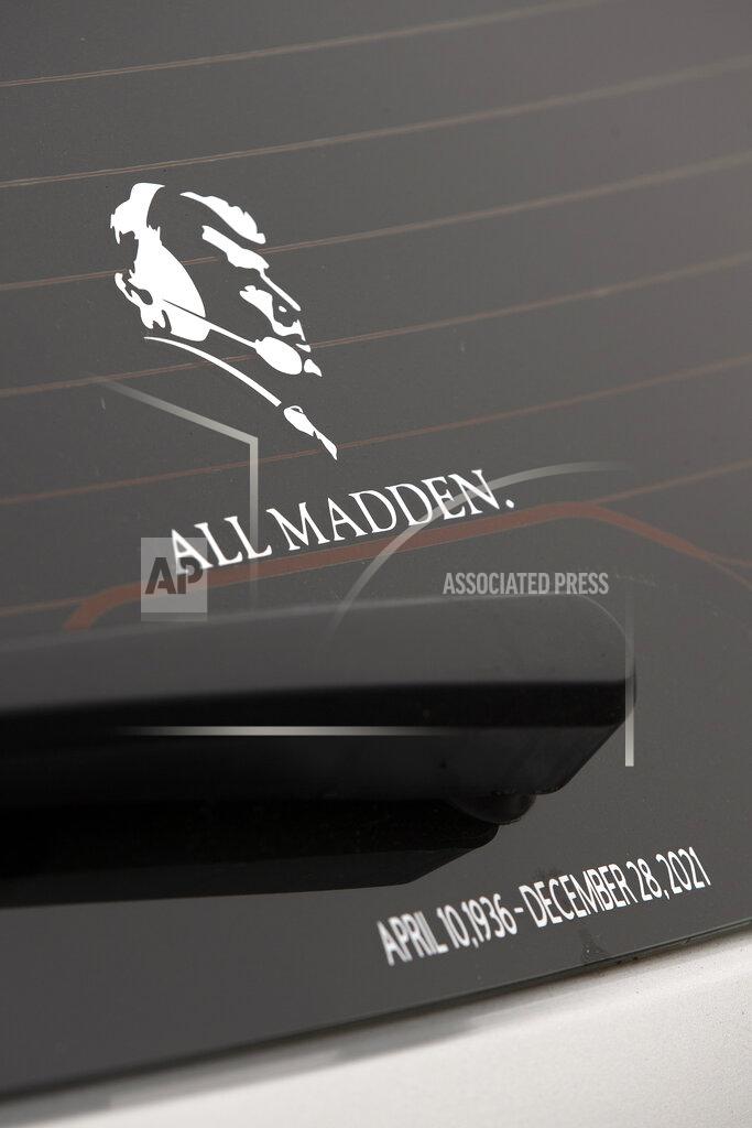 D. Ross Cameron An Oakland Raiders fan's auto sports a decal commemorating former NFL football coach and television commentator John Madden, Monday, Feb. 14, 2022, in Oakland, Calif. Madden, who died last year at age 85, was remembered by friends and colleagues during a public ceremony at the Oakland-Alameda County Coliseum. (AP Photo/D. Ross Cameron)