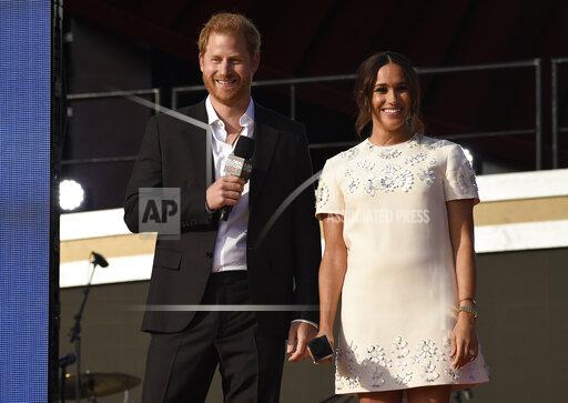 Prince Harry, the Duke of Sussex, left, and Meghan, the Duchess of Sussex speak at Global Citizen Live in Central Park on Saturday, Sept. 25, 2021, in New York. Global Citizen Live, a 24-hour concert that featured performances from Stevie Wonder, Jennifer Lopez, BTS and Elton John and dozens of other stars, raised $1.1 billion in commitments and pledges over the weekend to fight extreme poverty. Broadcasting from sites on six continents, including New York’s Central Park and in front of the Eiffel Tower in Paris, Global Citizen also secured pledges from France for 60 million COVID-19 vaccine doses for developing countries and corporate pledges for planting 157 million trees around the world. Vaccine pledges, which also came from the governments of Croatia and Ireland, followed numerous pleas, including from Prince Harry and Meghan, the Duke and Duchess of Sussex, onstage at Central Park on Saturday. (Photo by Evan Agostini/Invision/AP)