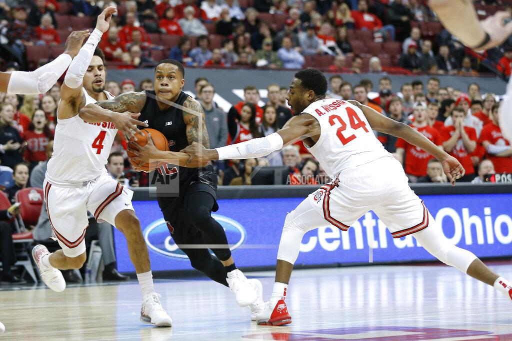 Jay Laprete Rutgers Jacob Young, center, drives to the basket between Ohio State's Duane Washington, left, and Andre Wesson during the first half of an NCAA college basketball game Wednesday, Feb. 12, 2020, in Columbus, Ohio. (AP Photo/Jay LaPrete)