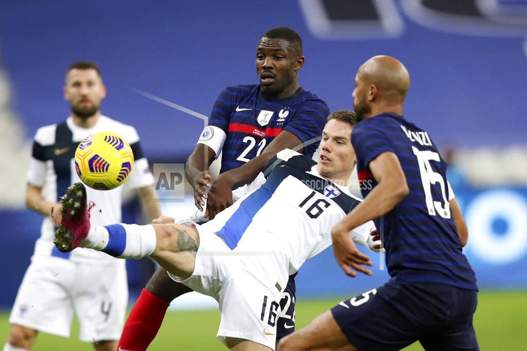 Michel Euler Finland's Robert Taylor, center, controls the ball during the international friendly soccer match between France and Sweden at the Stade de France stadium in Saint-Denis, outside Paris, Wednesday Nov.11, 2020. (AP Photo/Michel Euler)