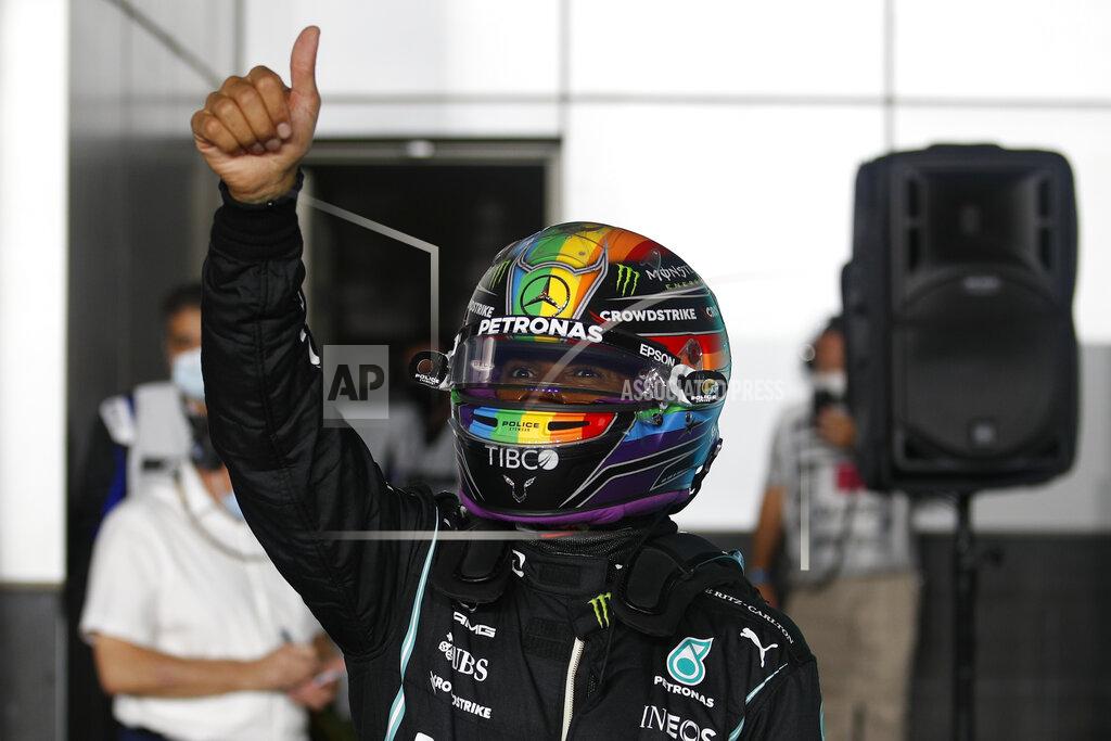 Hamad I Mohammed Mercedes driver Lewis Hamilton of Britain reacts after qualifying session qualifying session in Lusail, Qatar, Saturday, Nov. 20, 2021 ahead of the Qatar Formula One Grand Prix. (Hamad I Mohammed, Pool via AP)