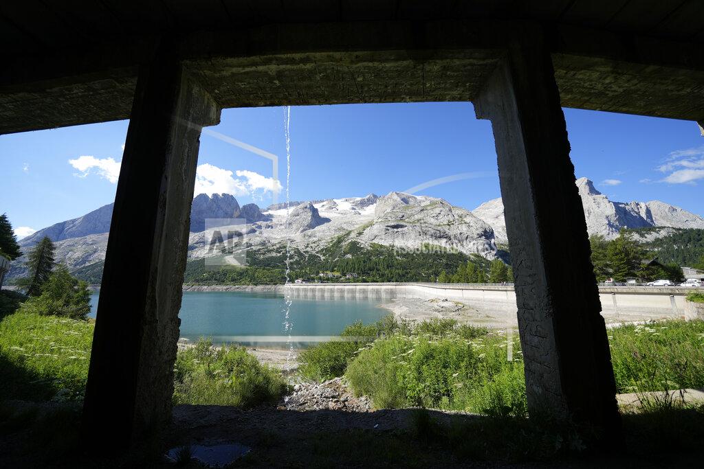 Luca Bruno A vie of the Marmolada mountain and the Punta Rocca glacier near Canazei, in the Italian Alps in northern Italy, Wednesday, July 6, 2022, where an avalanche broke loose on Sunday, sending tons of ice, snow, and rocks onto hikers. (AP Photo/Luca Bruno)