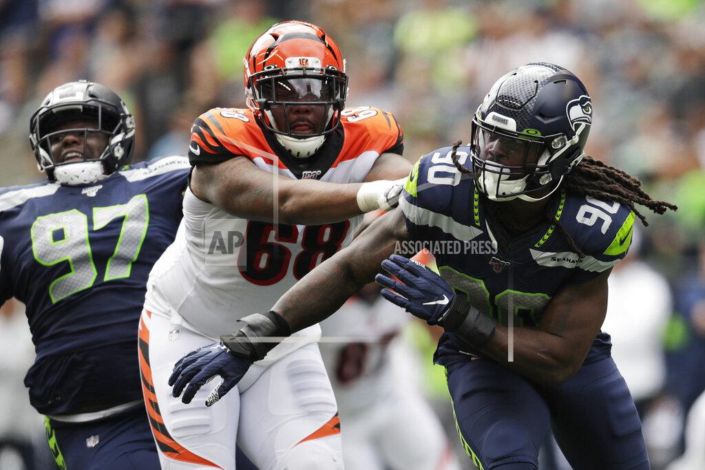 Stephen Brashear Seattle Seahawks defensive end Jadeveon Clowney, right, tries to get around Cincinnati Bengals offensive tackle Bobby Hart (68) during the first half of an NFL football game Sunday, Sept. 8, 2019, in Seattle. (AP Photo/Stephen Brashear)