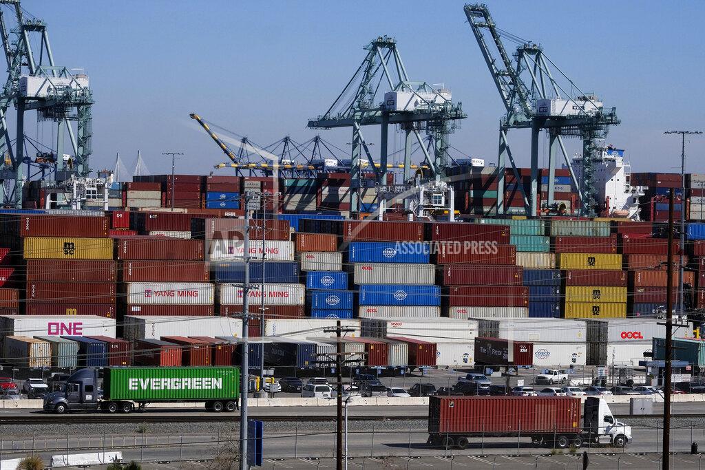 Ringo H.W. Chiu Cargo containers sit stacked at the Port of Los Angeles, Wednesday, Oct. 20, 2021, in San Pedro, Calif. California Gov. Gavin Newsom on Wednesday issued an order that aims to ease bottlenecks at the ports of Los Angeles and Long Beach that have spilled over into neighborhoods where cargo trucks are clogging residential streets. (AP Photo/Ringo H.W. Chiu)