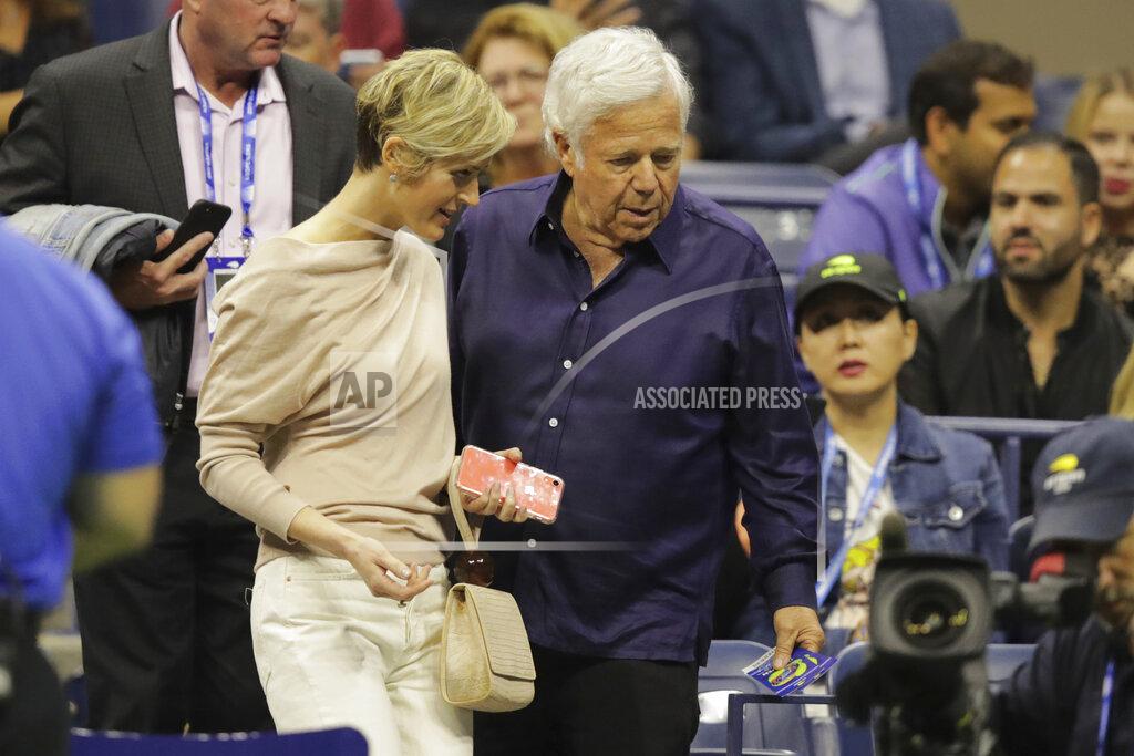 Charles Krupa New England Patriots owner Robert Kraft, right, and Dana Blumberg find their seats during the men's singles semifinals of the U.S. Open tennis championships Friday, Sept. 6, 2019, in New York. (AP Photo/Charles Krupa)
