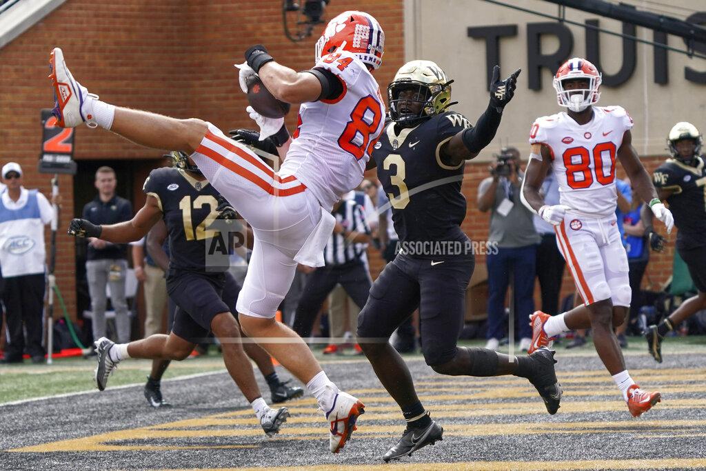 Chuck Burton Clemson tight end Davis Allen (84) catches a touchdown pass against Wake Forest's Malik Mustapha (3) during the second half of an NCAA college football game in Winston-Salem, N.C., Saturday, Sept. 24, 2022. (AP Photo/Chuck Burton)