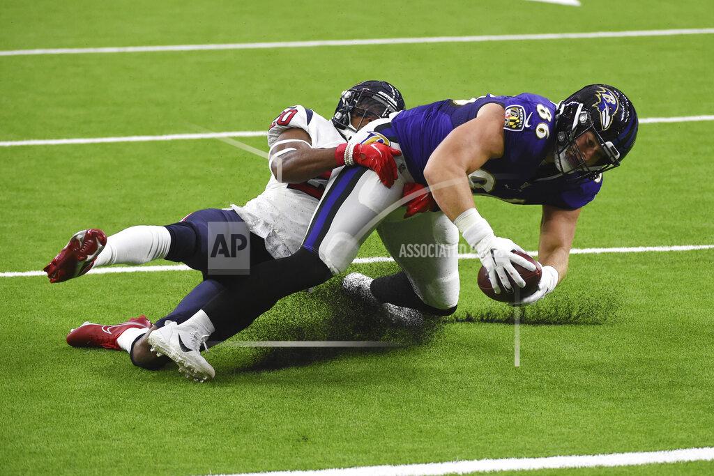 Eric Christian Smith Baltimore Ravens tight end Nick Boyle (86) makes a catch in front of Houston Texans strong safety Justin Reid (20) during the first half of an NFL football game Sunday, Sept. 20, 2020, in Houston. (AP Photo/Eric Christian Smith)