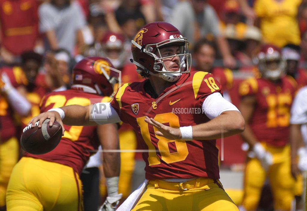 Mark J. Terrill FILE - In this Sept. 1, 2018, file photo, Southern California quarterback J.T. Daniels passes during the first half of an NCAA college football game against UNLV in Los Angeles. USC takes on UCLA on Saturday. (AP Photo/Mark J. Terrill, File)