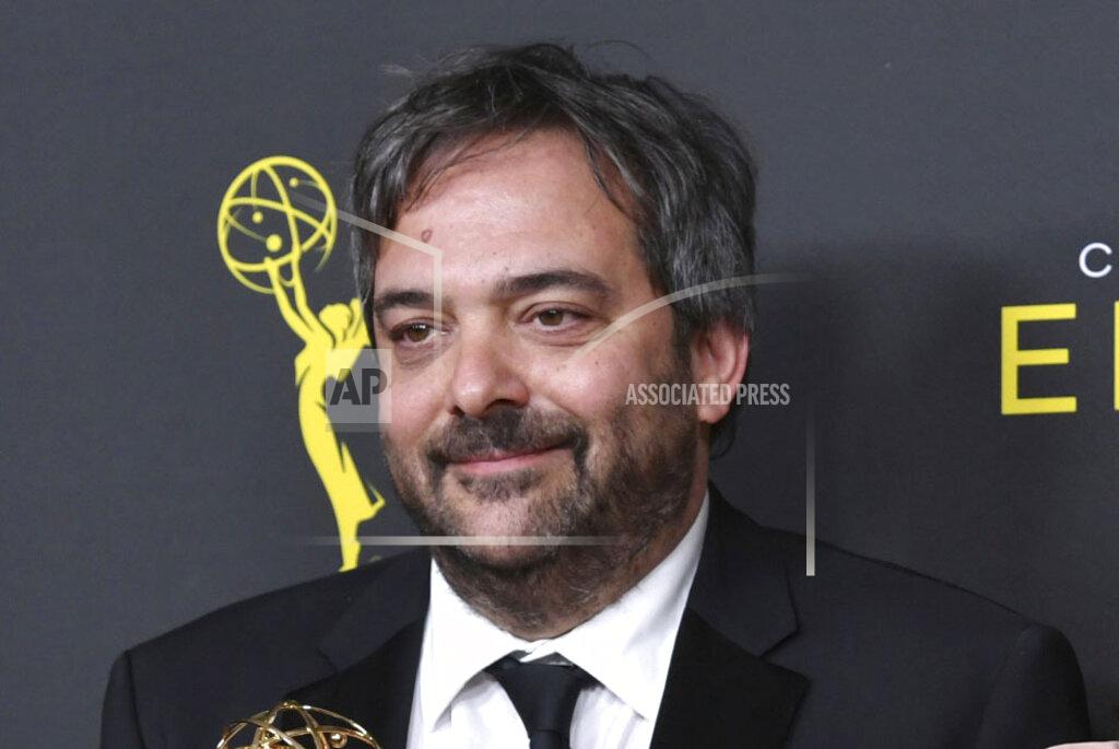 Richard Shotwell FILE - This Sept. 14, 2019 file photo shows Adam Schlesinger at the Creative Arts Emmy Awards in Los Angeles. (Photo by Richard Shotwell/Invision/AP, File)