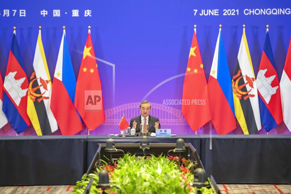 Wang Quanchao In this photo released by Xinhua News Agency, Chinese State Councilor and Foreign Minister Wang Yi speaks during a special ASEAN-China Foreign Ministers' Meeting in Celebration of the 30th Anniversary of Dialogue Relations attended by foreign ministers from ASEAN countries, in Chongqing, southwestern China, Monday, June 7, 2021. China is hosting foreign ministers from 10 Southeast Asian nations this week in the southwestern megacity of Chongqing amid heightened competition between Beijing and Washington for influence in the region. (Wang Quanchao/Xinhua via AP)