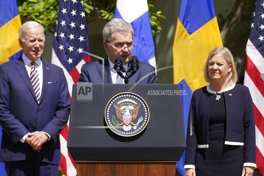 Andrew Harnik Finnish President Sauli Niinisto speaks, with President Joe Biden and Swedish Prime Minister Magdalena Andersson, in the Rose Garden of the White House in Washington, Thursday, May 19, 2022. (AP Photo/Andrew Harnik)
