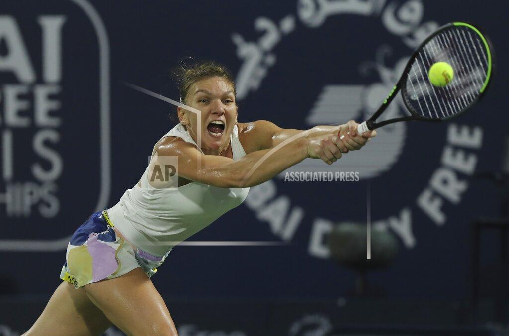 Kamran Jebreili FILE - In this Feb. 22, 2020, file photo, Romania's Simona Halep returns the ball to Kazakhstan's Elena Rybakina during the final match of the Dubai Duty Free Tennis Championship in Dubai, United Arab Emirates. Halep says she will skip the U.S. Open. She says she wants to put her health first and prefers to stay in Europe amid the coronavirus pandemic. (AP Photo/Kamran Jebreili, File)