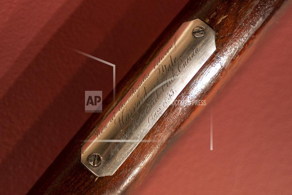 John Minchillo The Harvard-Yale Regatta 1852 Trophy Oars are displayed before an auction, Thursday, April 21, 2022, at Sotheby's in the Manhattan borough of New York. Sotheby's estimates the oars value between three and five million dollars. The oars were awarded to Harvard's winning crew and represent one of the oldest collegiate athletic competitions in the nation's history. (AP Photo/John Minchillo)