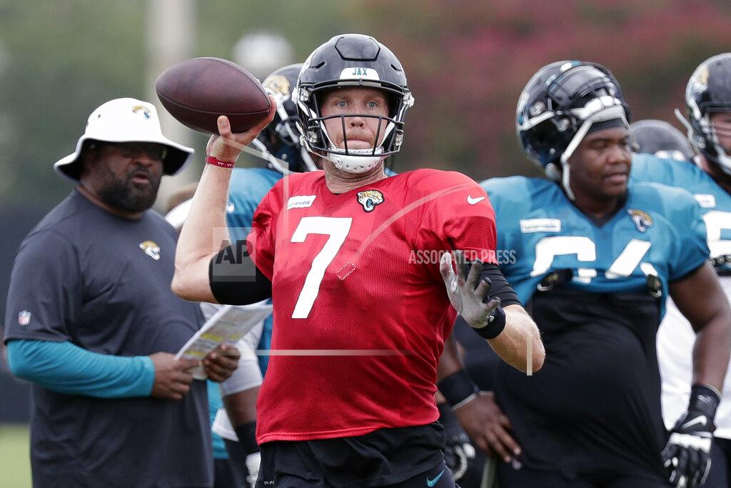 John Raoux Jacksonville Jaguars quarterback Nick Foles (7) throws a pass during an NFL football practice at the teams training facility, Thursday, Aug. 1, 2019, in Jacksonville, Fla. (AP Photo/John Raoux)