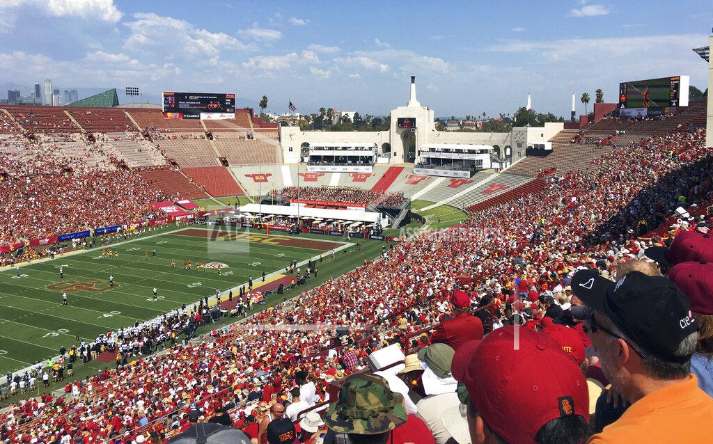 John Antczak In this Sept. 2, 2017 photo, fans fill the Los Angeles Memorial Coliseum during a University of Southern California NCAA college football game in Los Angeles. United Airlines offered Friday, March 29, 2019, to withdraw from a $69 million deal to change Los Angeles Memorial Coliseum into United Airlines Memorial Coliseum following criticism that adding a corporate name is disrespectful to the facility's history of honoring troops who fought and died in World War I.
(AP Photo/John Antczak)