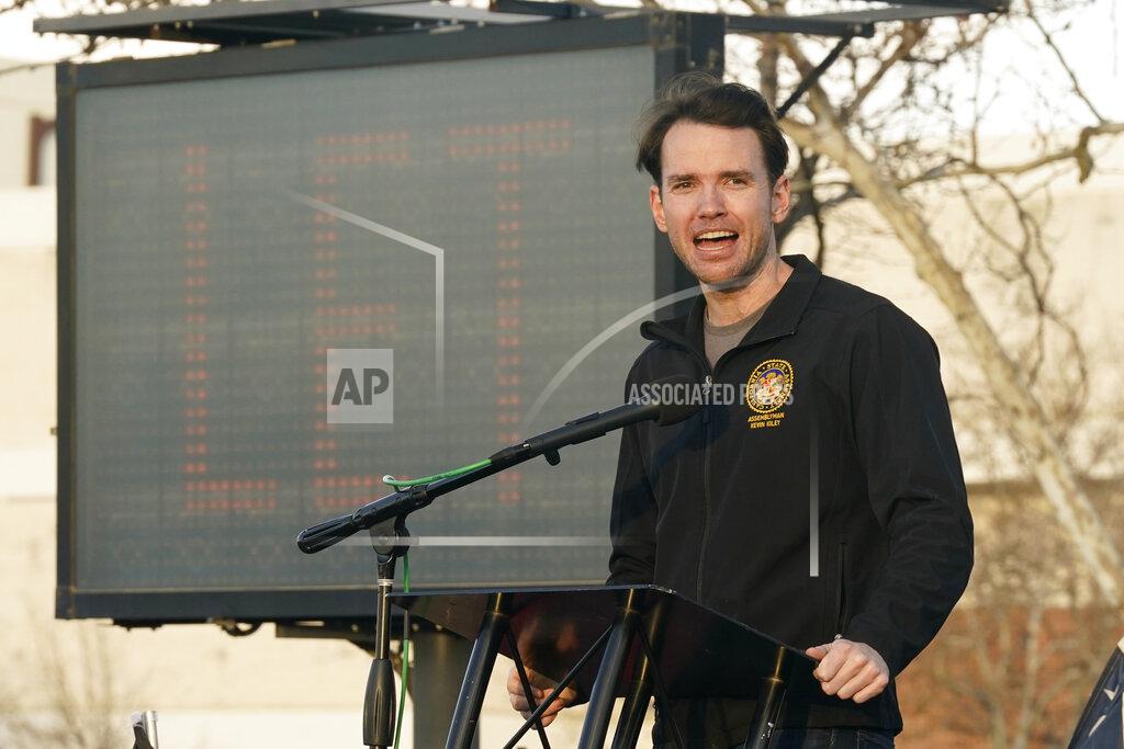 Rich Pedroncelli FILE — In this Jan. 29, 2021 file photo Assemblyman Kevin Kiley, R-Rocklin, speaks at a "Let Them Play Rally" calling for Gov. Gavin Newsom to allow the state's school children to participate in sports, held in Citrus Heights, Calif. Kiley is among the more than three dozen people who filed the required paperwork to run in the Sept. 14 recall election that could remove Newsom from office. (AP Photo/Rich Pedroncelli, File)