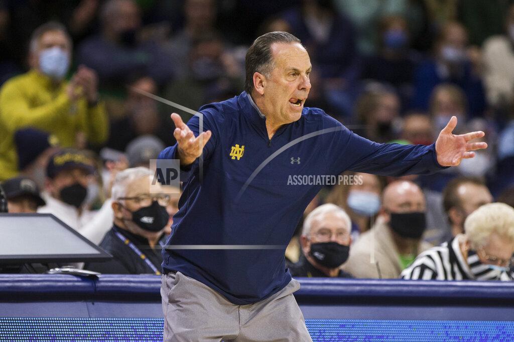 Robert Franklin Notre Dame head coach Mike Brey waves his arms to pump up the crowd during the second half of an NCAA college basketball game against Virginia on Saturday, Jan. 29, 2022, in South Bend, Ind. (AP Photo/Robert Franklin)